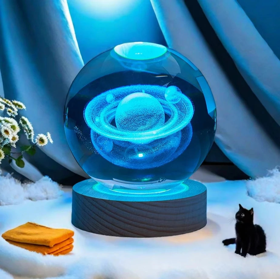 Glass crystal ball featuring a 3D Saturn solar system and moon design, ideal for home decor and Valentine's Day gift.