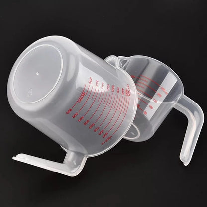 Prime Deal Zone 3-piece plastic baking liquid measuring cups with PVC scale, 250ml, 500ml, and 1000ml volume beakers for kitchen use.