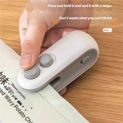 Prime Deal Zone HOMEFISH mini handheld USB rechargeable food sealer sealing plastic storage bags for fresh food preservation.
