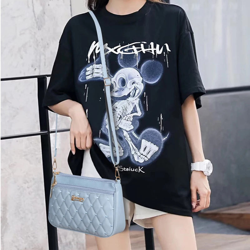 Leather embroidery messenger bag for women by Prime Deal Zone, stylish handbag with floral embroidery and spacious interior.