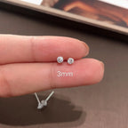 Sterling silver CZ stud earrings, round cubic zirconia - view 5