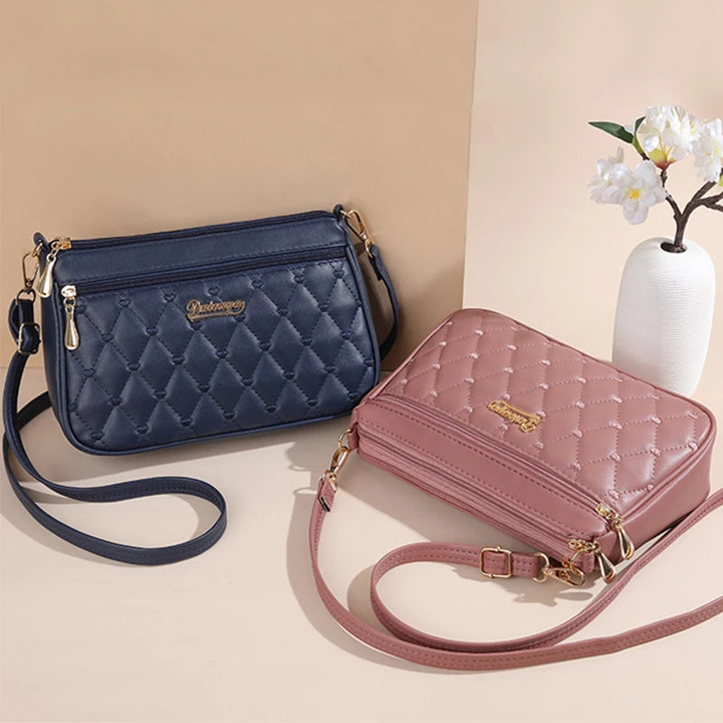 Leather embroidery messenger bag for women with hairball design, stylish handbag by Prime Deal Zone, suitable for casual use.