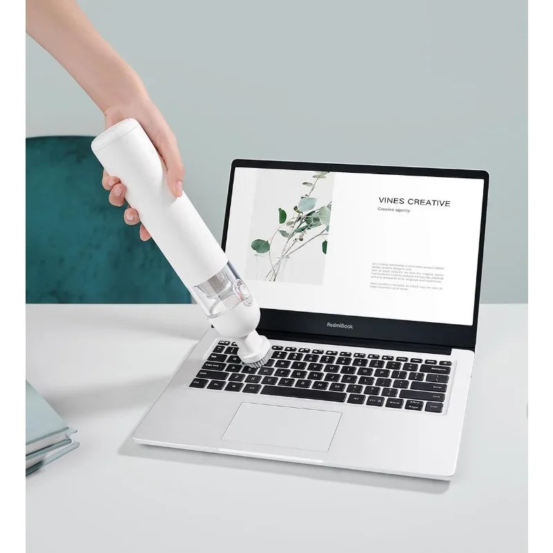 Xiaomi Mijia portable handheld vacuum cleaner with cyclone suction, compact design, and 13000PA dust collection for home and car cleaning.