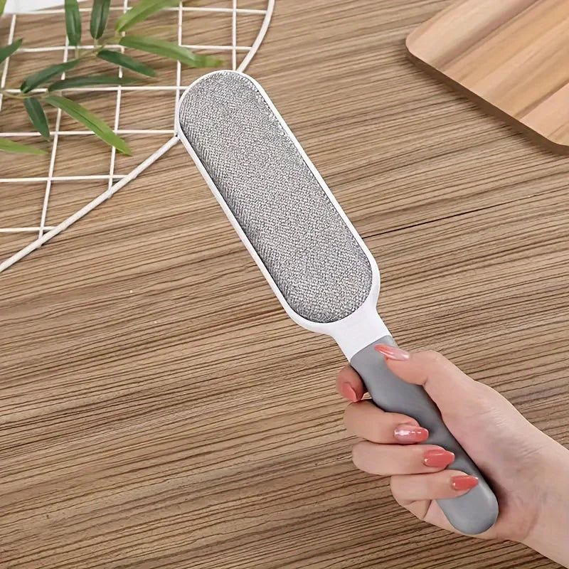 Double-sided Prime Deal Zone pet hair remover lint brush with electrostatic sticky surface for cleaning cats, clothing, sofa, and carpet.