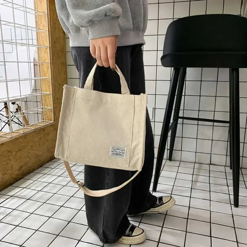 Prime Deal Zone women's corduroy crossbody tote bag with square shape, casual shoulder design, ideal for travel and everyday use.