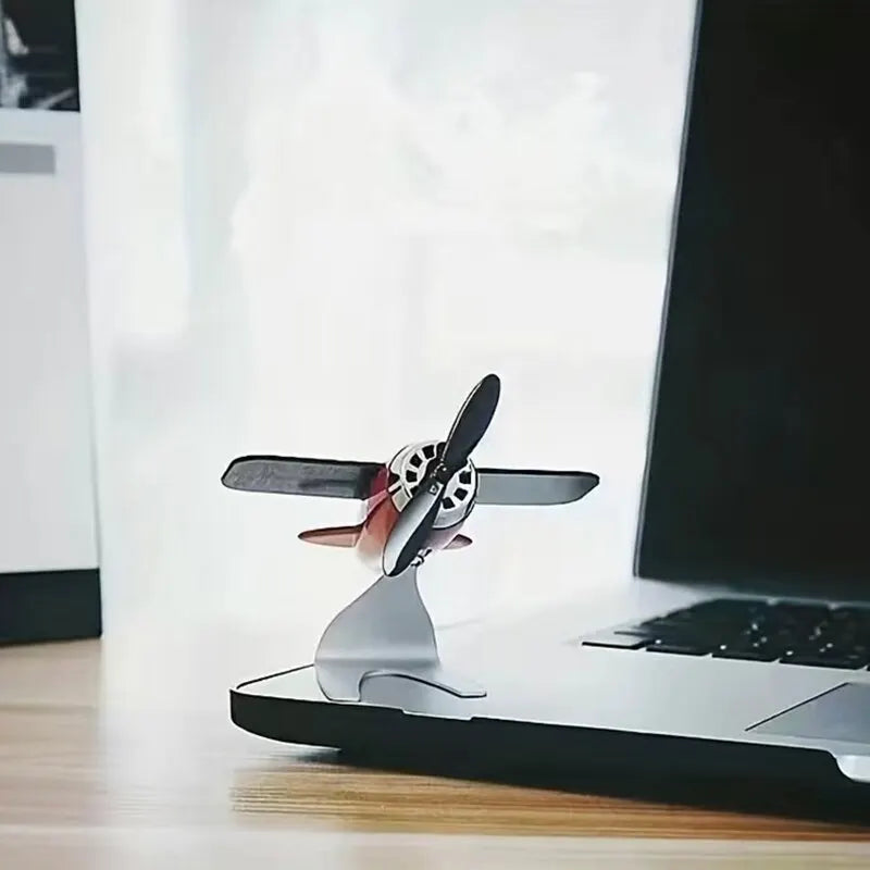 Creative solar-powered airplane desktop ornament for car interior decoration, ideal gift for car enthusiasts and men or women.