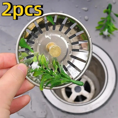 Two Prime Deal Zone kitchen sink strainers with stopper and waste plug for filtering and preventing clogs in kitchen drains.