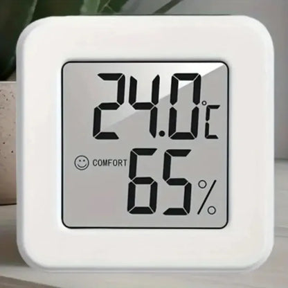 Indoor mini temperature and humidity meter from Prime Deal Zone with digital display showing room temperature and humidity levels.