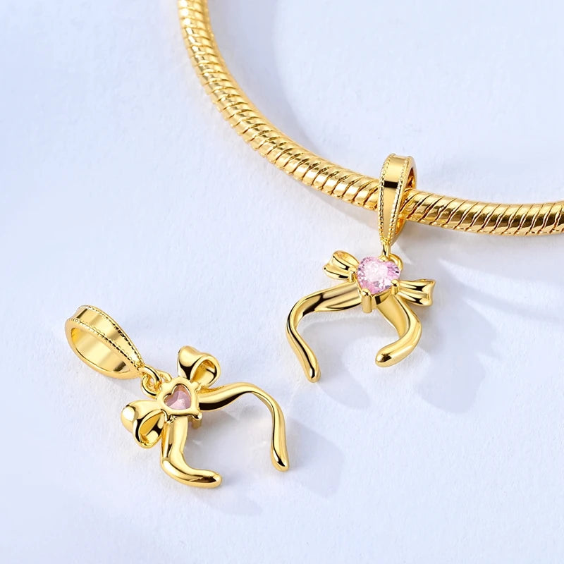 925 sterling silver gold-tone charm beads, crosses and bows - view 2