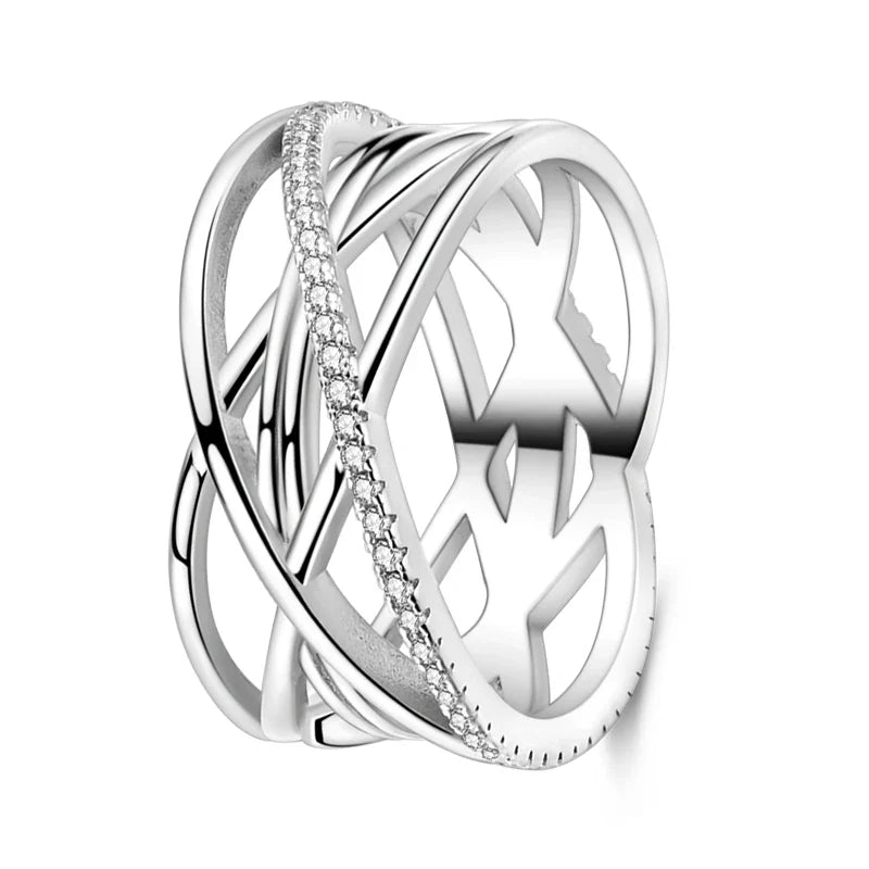 Silver X ring close-up on hand