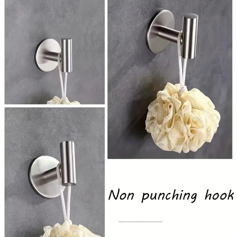 Stainless steel non-perforated bathrobe hook by Prime Deal Zone, mounted on bathroom wall for towels, hats, and clothes.