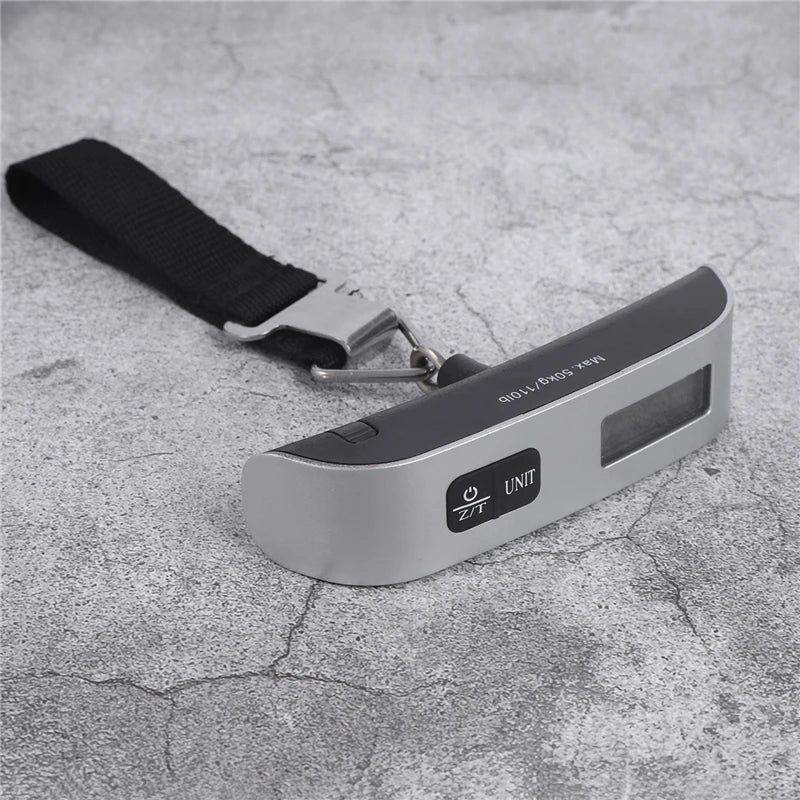 Digital portable luggage scale with LCD display, 110lb/50kg capacity, used for weighing suitcases and travel bags by Prime Deal Zone.