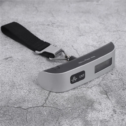 Digital portable luggage scale with LCD display, 110lb/50kg capacity, used for weighing suitcases and travel bags by Prime Deal Zone.