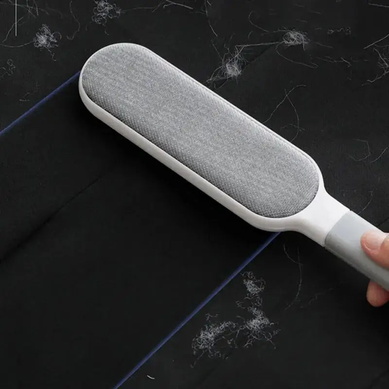 Double-sided Prime Deal Zone pet hair remover lint brush with electrostatic sticky surface for cleaning cats, clothing, sofa, and furniture.