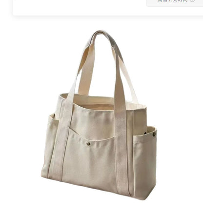 Large-capacity canvas shoulder bag by Prime Deal Zone, versatile design for students' class and daily use, with durable cloth material.