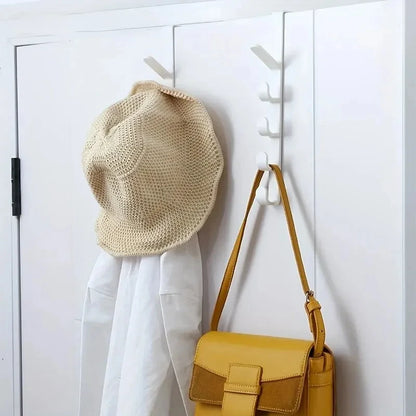 Plastic over-the-door hanger rack from Prime Deal Zone, holding purses and bags in a bedroom for home storage organization.