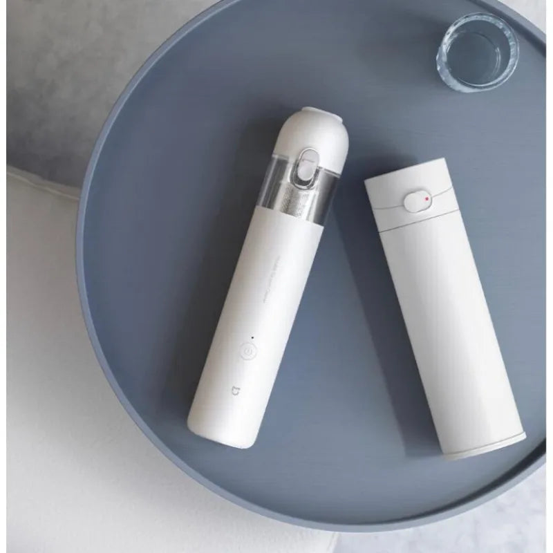 Xiaomi Mijia portable handheld vacuum cleaner with cyclone suction, wireless design, and dust collector for home and car cleaning.