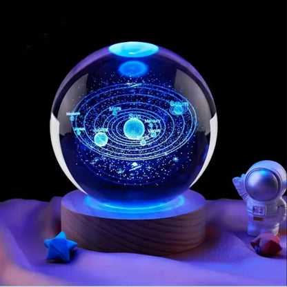 Crystal ball featuring 3D Saturn solar system with moons and planets, perfect for home decor and Valentine's Day gift.