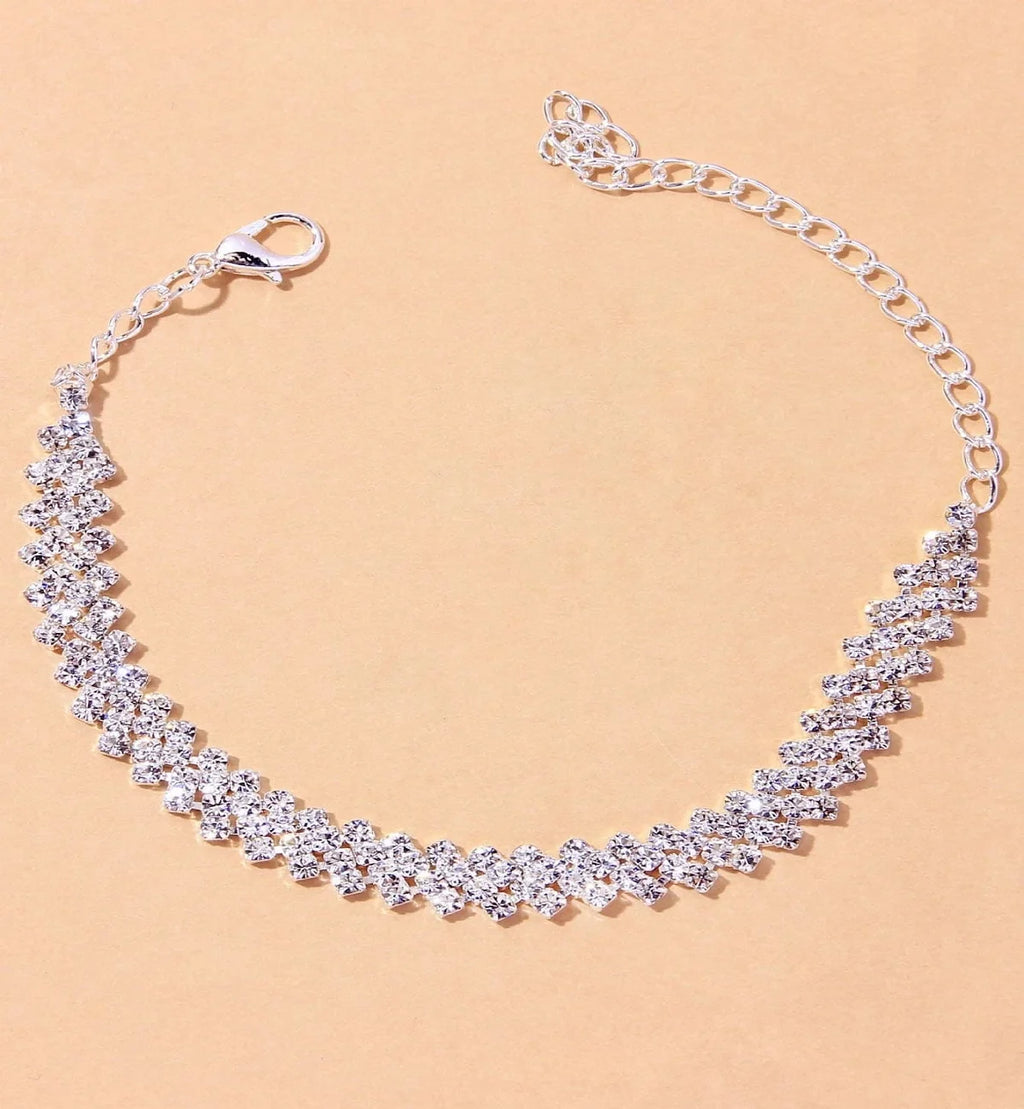 Women's copper inlaid water diamond love foot chain bracelet with elegant design, perfect for wedding and party accessories.