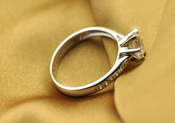 925 sterling silver six-claw ring worn on hand