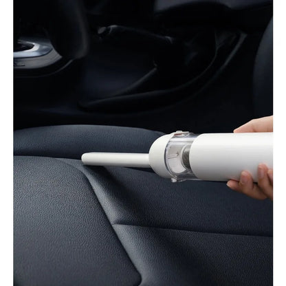 Xiaomi Mijia portable handheld vacuum cleaner with cyclone suction, compact design, ideal for home and car cleaning.