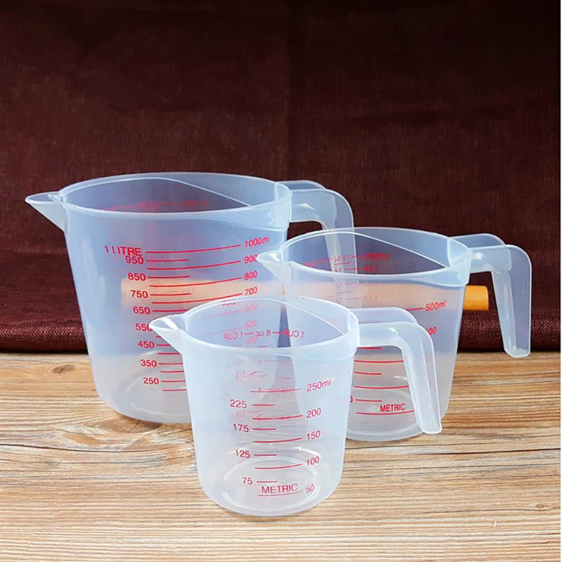Set of three Prime Deal Zone plastic baking measuring cups with PVC scale, 250ml, 500ml, and 1000ml, for accurate kitchen measurements