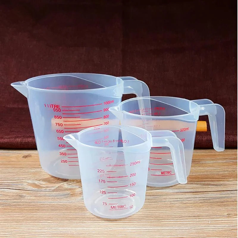 Set of three Prime Deal Zone plastic baking liquid measuring cups with PVC scale and volume markings for kitchen baking.