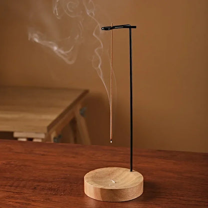 Wooden upside-down incense burner and stick holder with round tray, decorative ornament for bedroom, home, and yoga spaces.