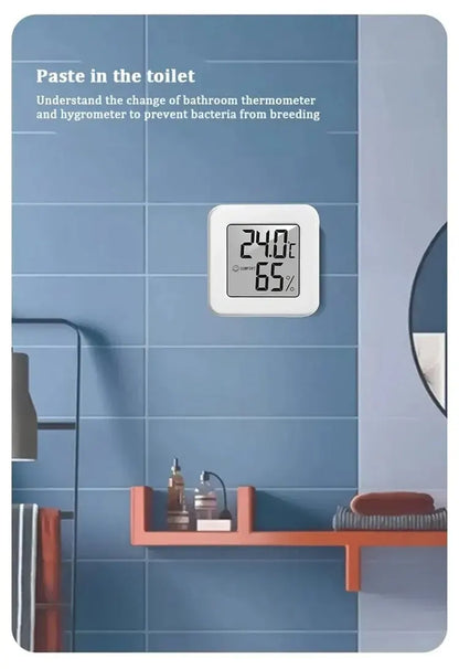 Prime Deal Zone indoor mini temperature and humidity meter with digital display, portable electronic device for bedroom climate monitoring.