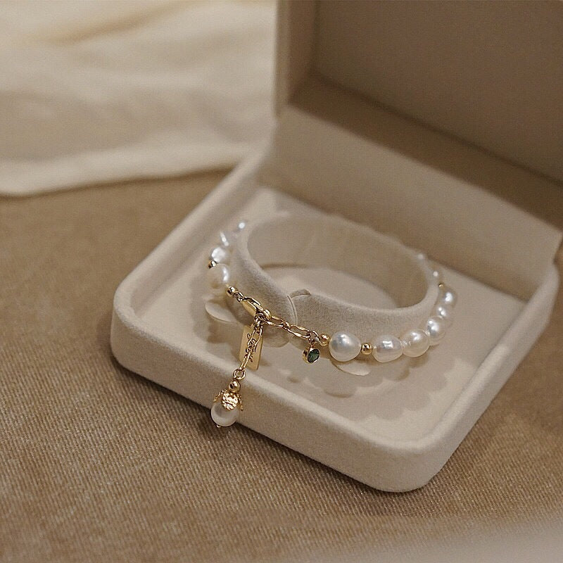 Zircon pearl bracelet worn on wrist